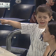 Illustration for article titled Sad Tiny Yankees Fan Doesnt Want Anyone Cheering Chris Coghlans Home Run
